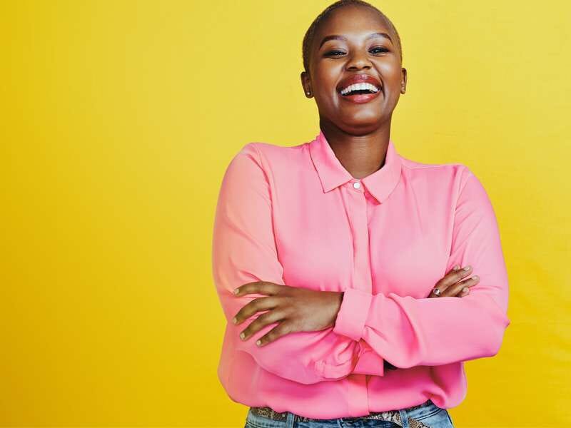 A-woman-smiling-and-looking-joyful