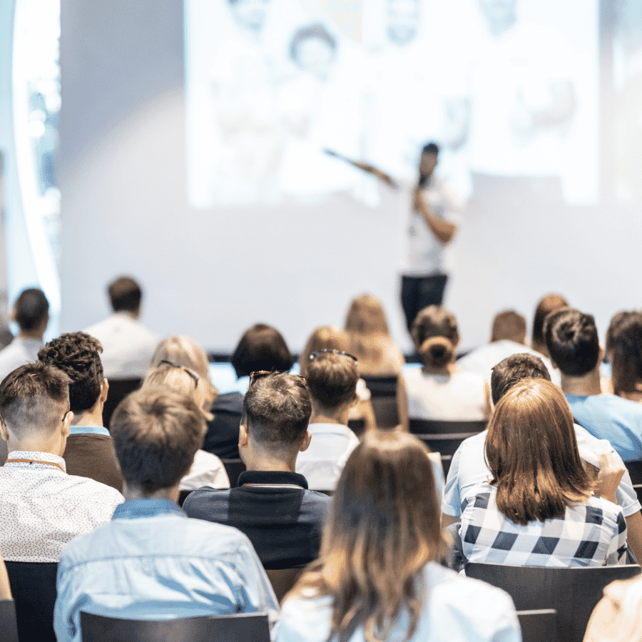 a business speaker at a corporate communications events